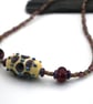 lampwork glass purple dots necklace