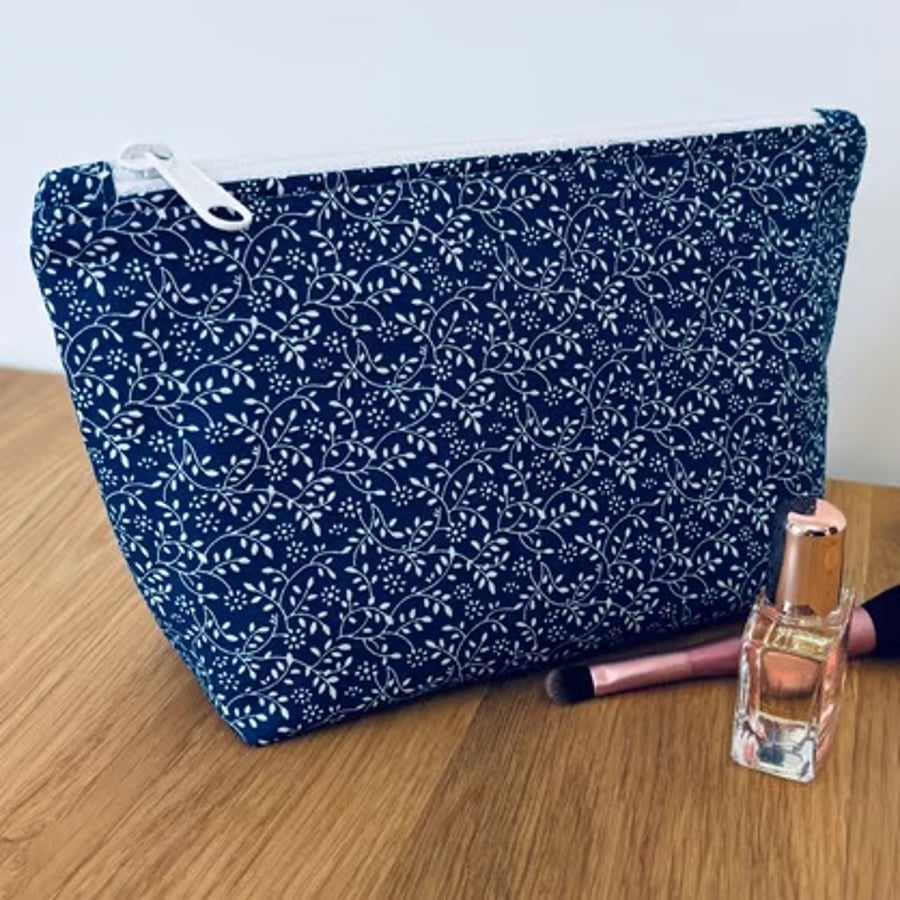 Make up bag, small toiletry bag, water resistant lining, in a blue floral design