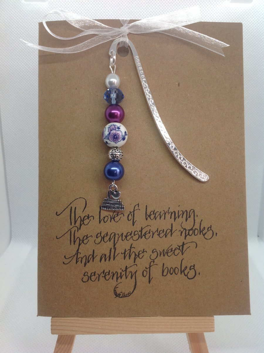 An A6 Kraft card with hand made bookmark attached.