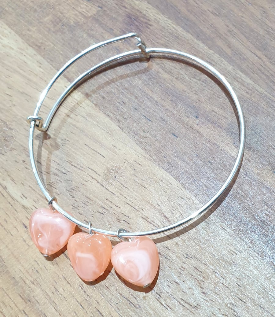 Antiqued silver Tone Expandable Bangle with Three Pink Hearts 