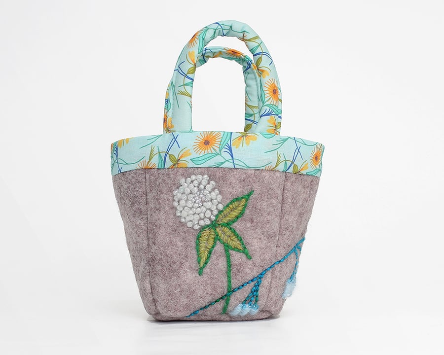 Tiny grey felt bag with clover and bluebell embroidery