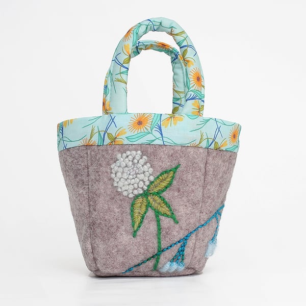 Tiny grey felt bag with clover and bluebell embroidery