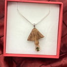 Mushroom Pendant on 40cm silver plated snake chain with Faceted Peridot crystal