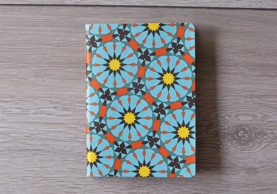 Handmade A6 pocket notebook with blue and orange geometric decorative cover
