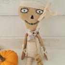 Hanging primitive zombie doll