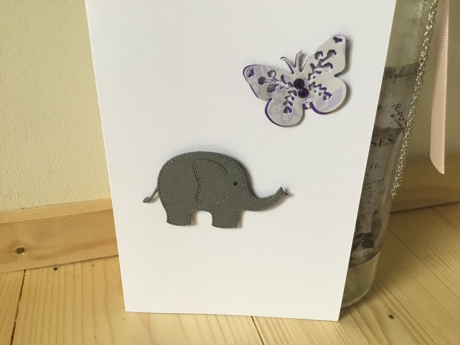 A cute elephant and butterfly any occasion card. CC311