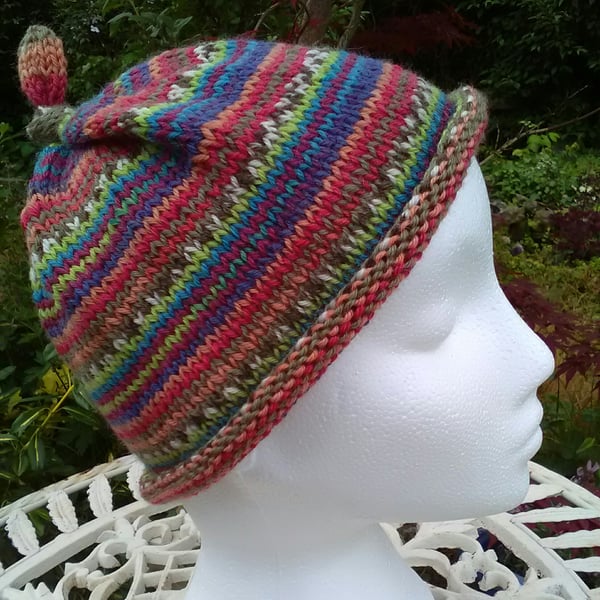 Handknit KNOTTY TOP BEANIE Stripey jacquard in reds blues multi child teen adult