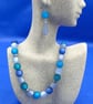 Necklace of Polaris matt beads in tones of blue and green - Image 1
