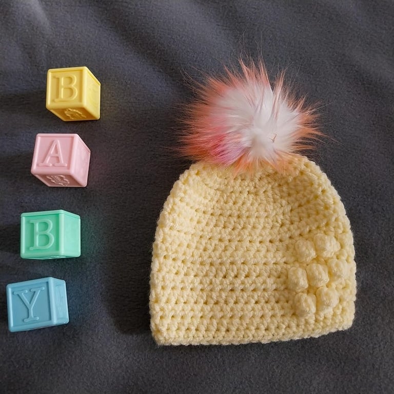 Lemon baby crocheted hat white faux fur pompom with orange purple & pink 