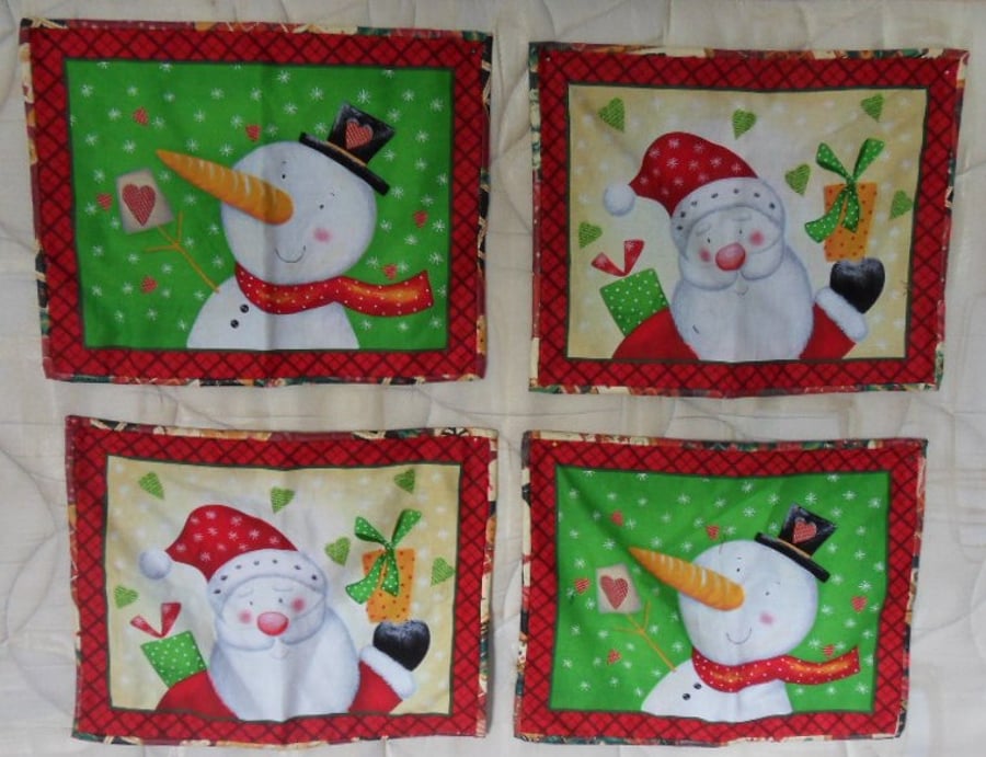 Homemade Christmas table mats. 4 in set. 2 father Christmas, 2 snowmen