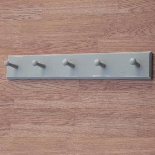 Painted and aged peg rack 