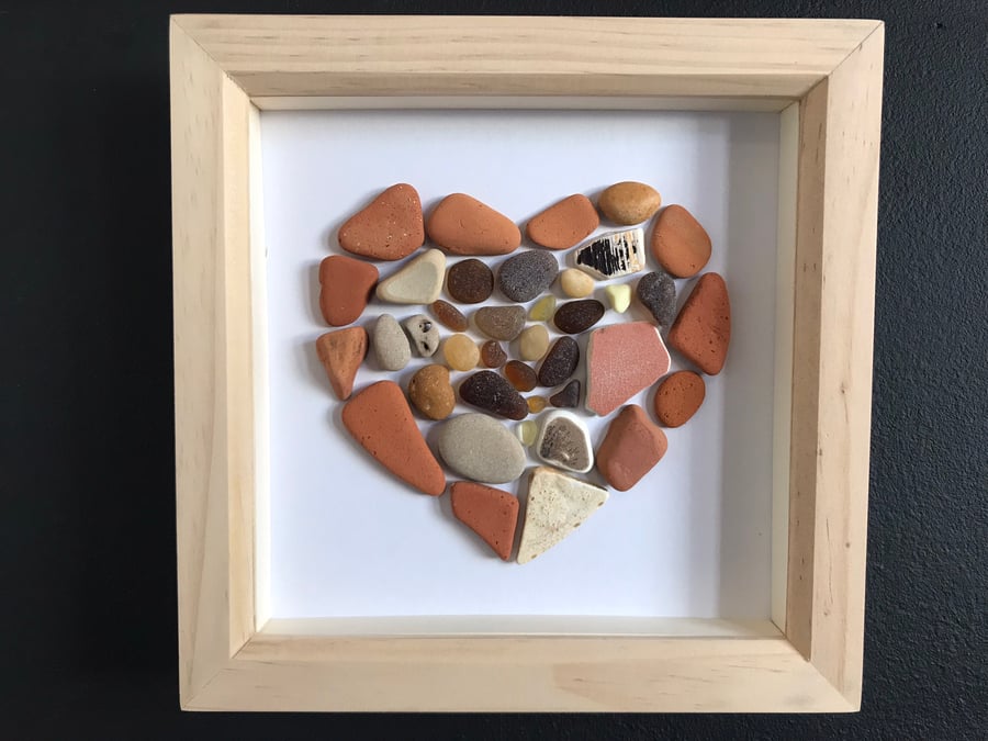 Sea glass and pottery heart picture.