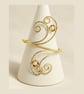 Elegant brass arm cuff with swirling design and pearls  and gold hematite 