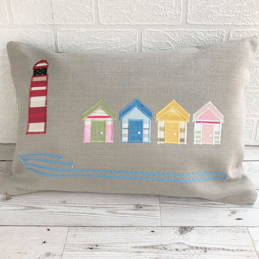 Lighthouse and beach huts cushion, rectangular cushion