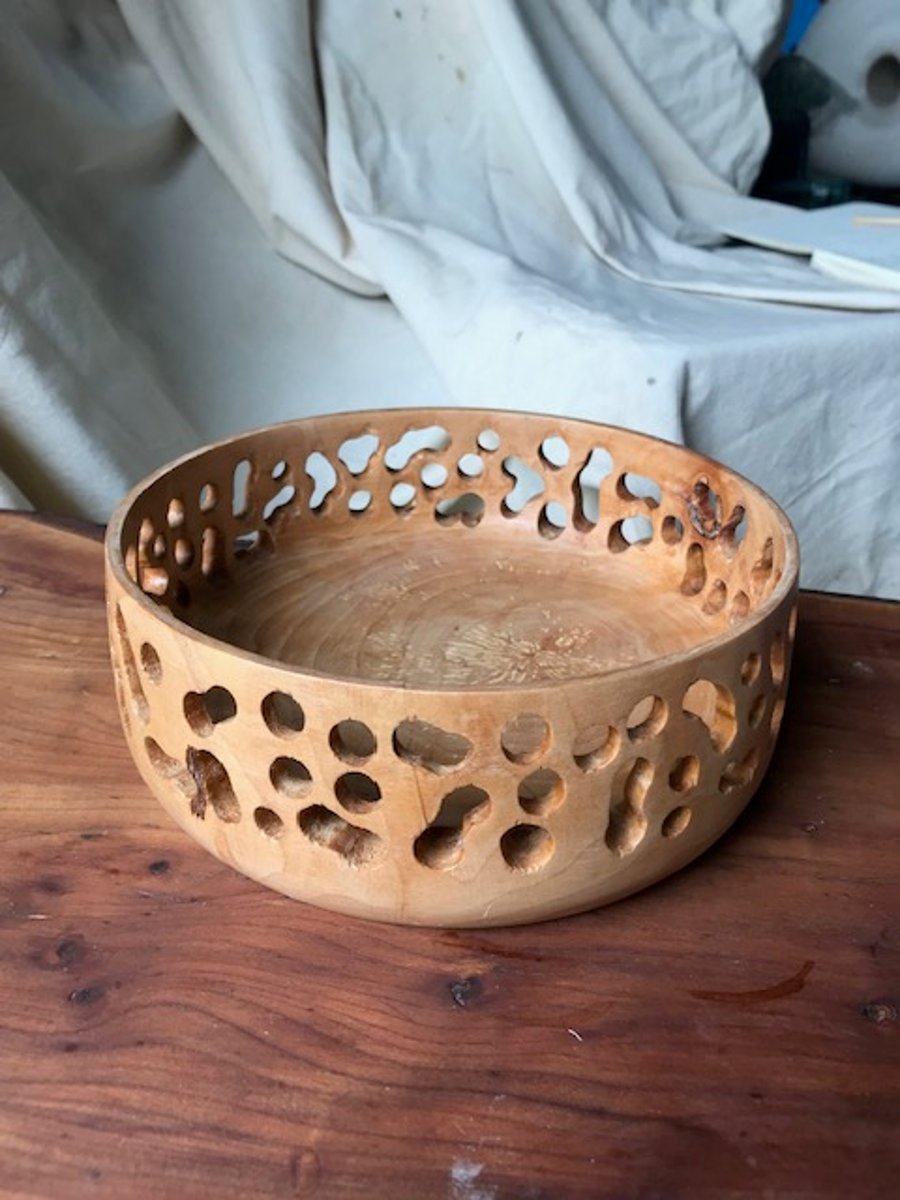 Pierced cherry wood bowl