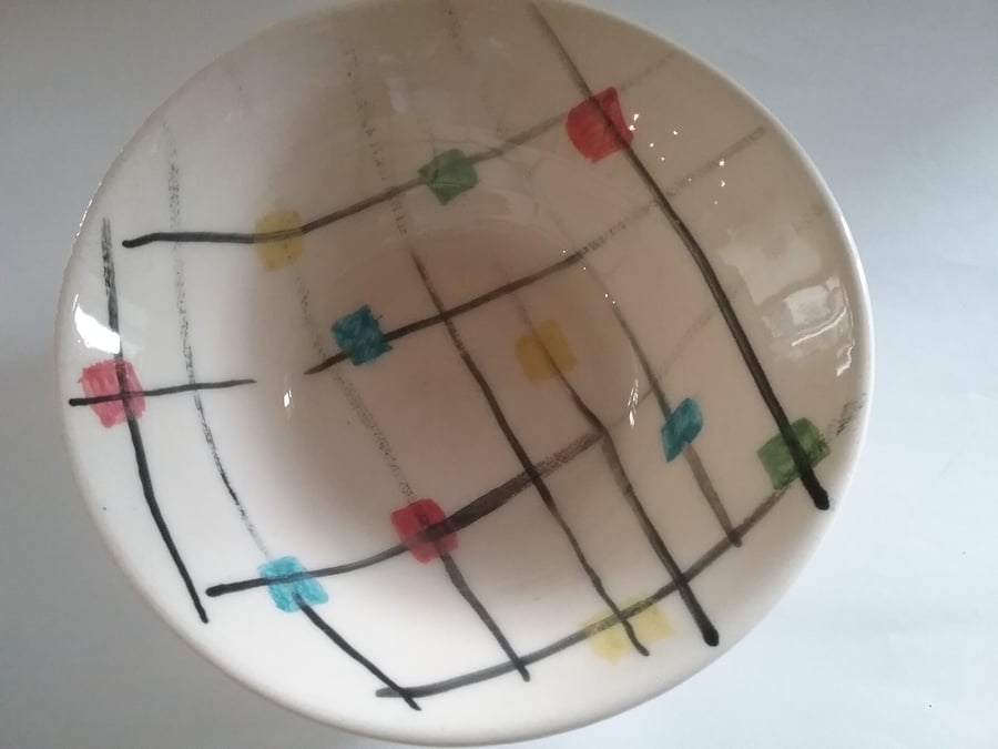 Ceramic pottery bowl hand made with a cheerful check pattern. Seconds Sunday