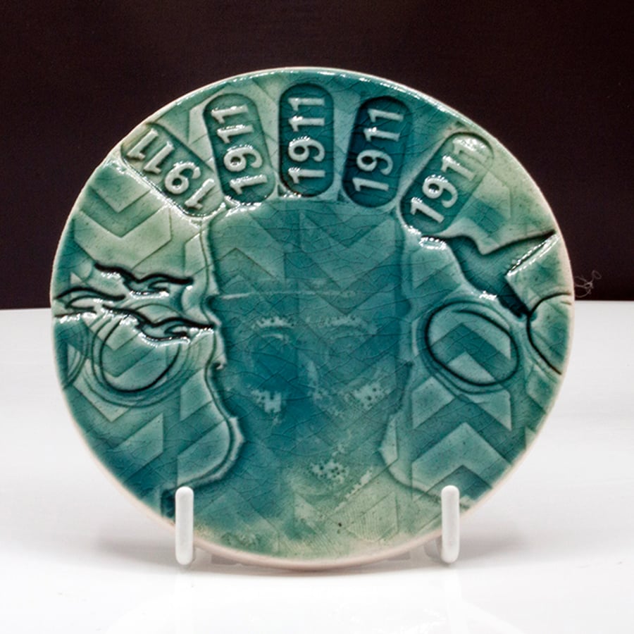 Textured Circular Ceramic Wall Piece: 1911