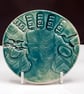 Textured Circular Ceramic Wall Piece: 1911