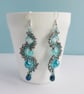 Aqua Blue Beaded Ocean Wave Statement Earrings - Image 1