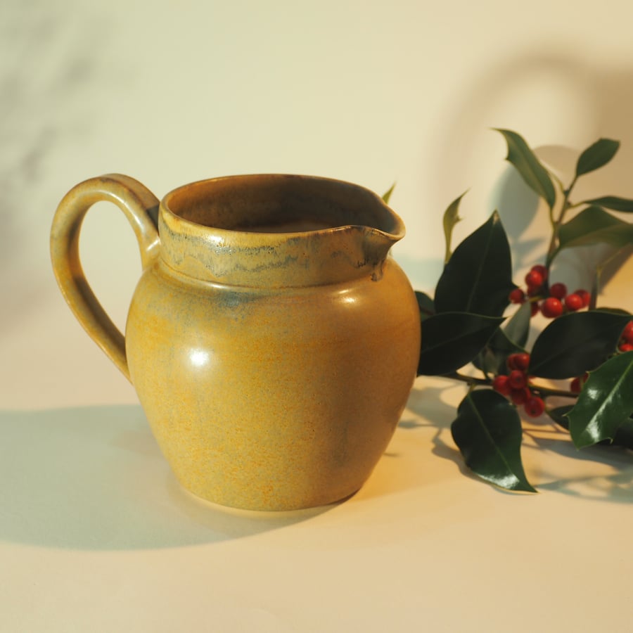 Hand made ceramic pint jug in matt brown