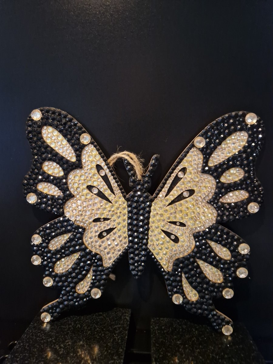 Sequinned wooden butterfly. 