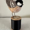 Coal tit on a bobbin 