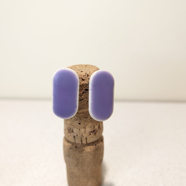 Faux ceramic purple pill stud earrings 