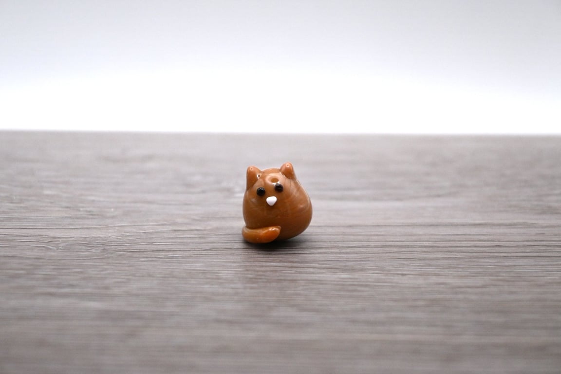 small glass cat figure