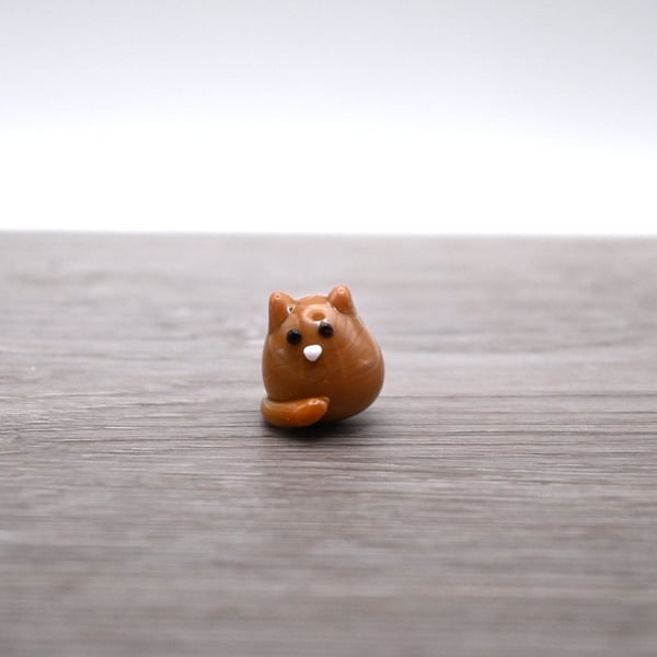 small glass cat figure