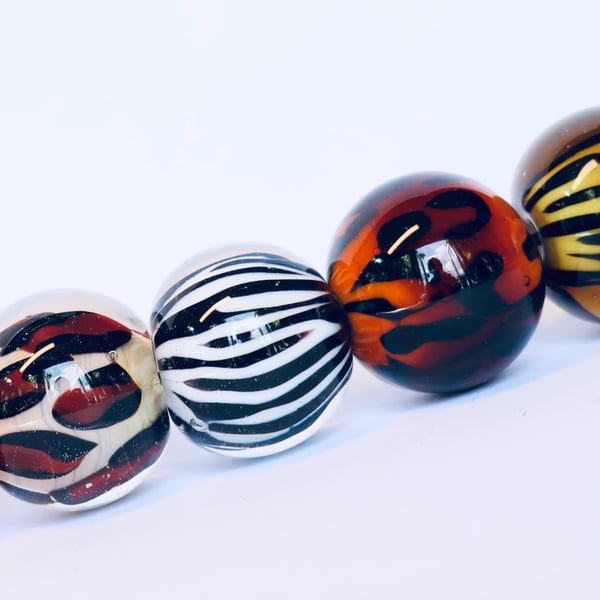 Handmade animal print patterned lamp work glass beads