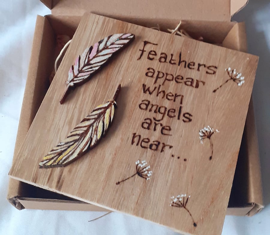 Angels and feather sign 