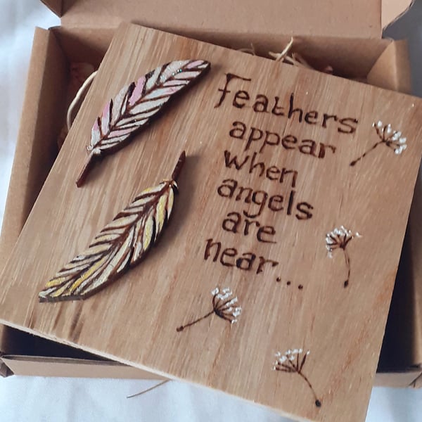 Angels and feather sign 