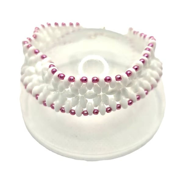 White superduo bead flower pattern bracelet with pink faux pearl edging