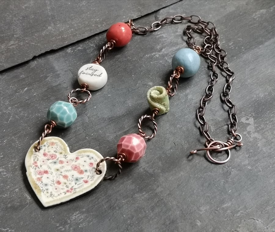 Ceramic floral heart and bead necklace, stay focused, copper chain