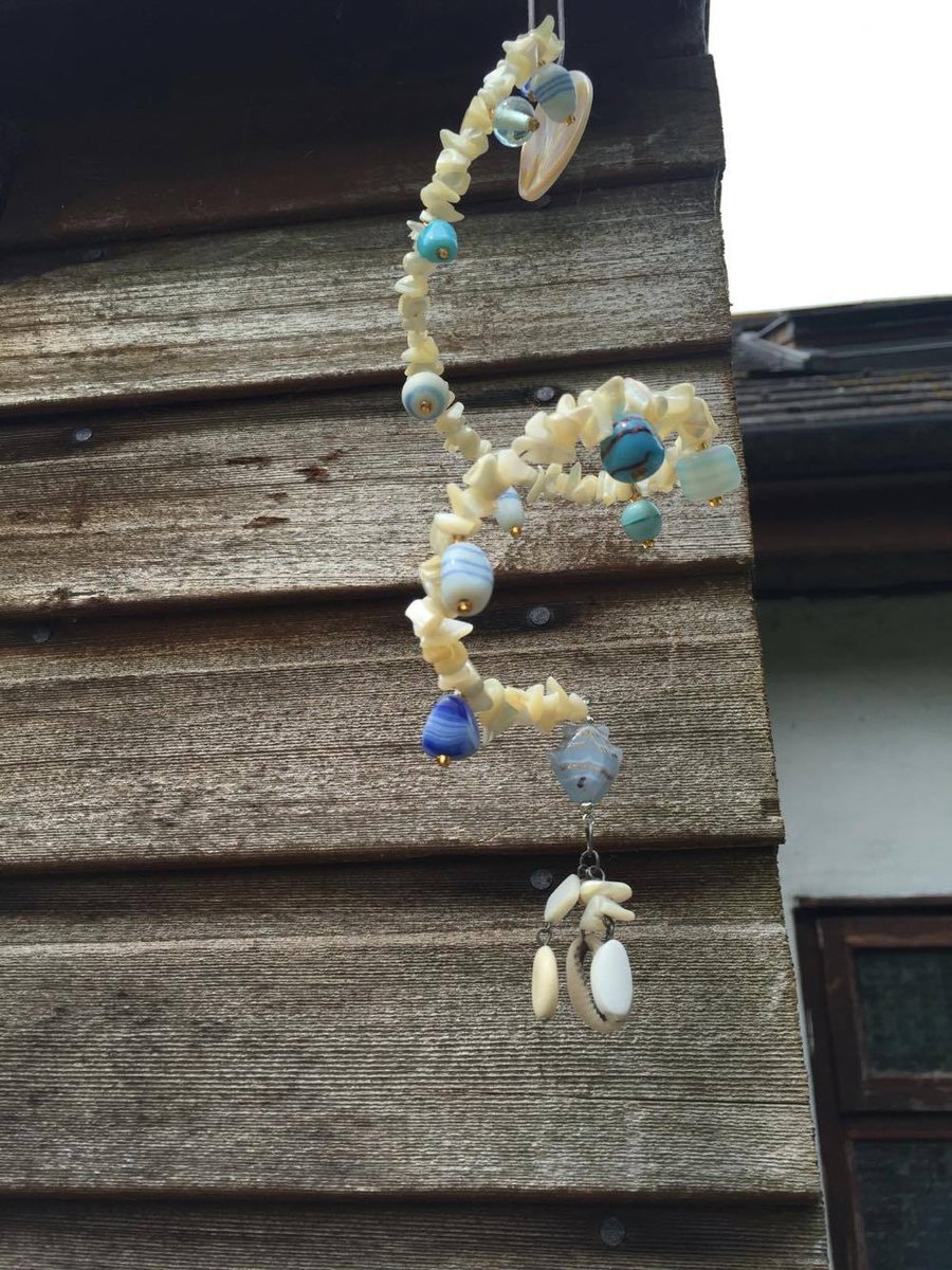 Shell and glass bead hanging decoration