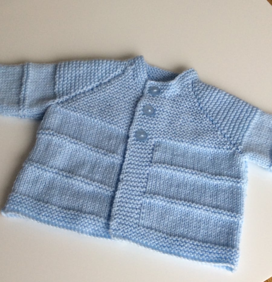 Hand knitted blue baby cardigan 