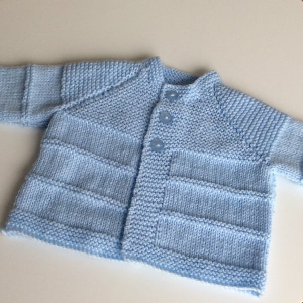 Hand knitted blue baby cardigan 