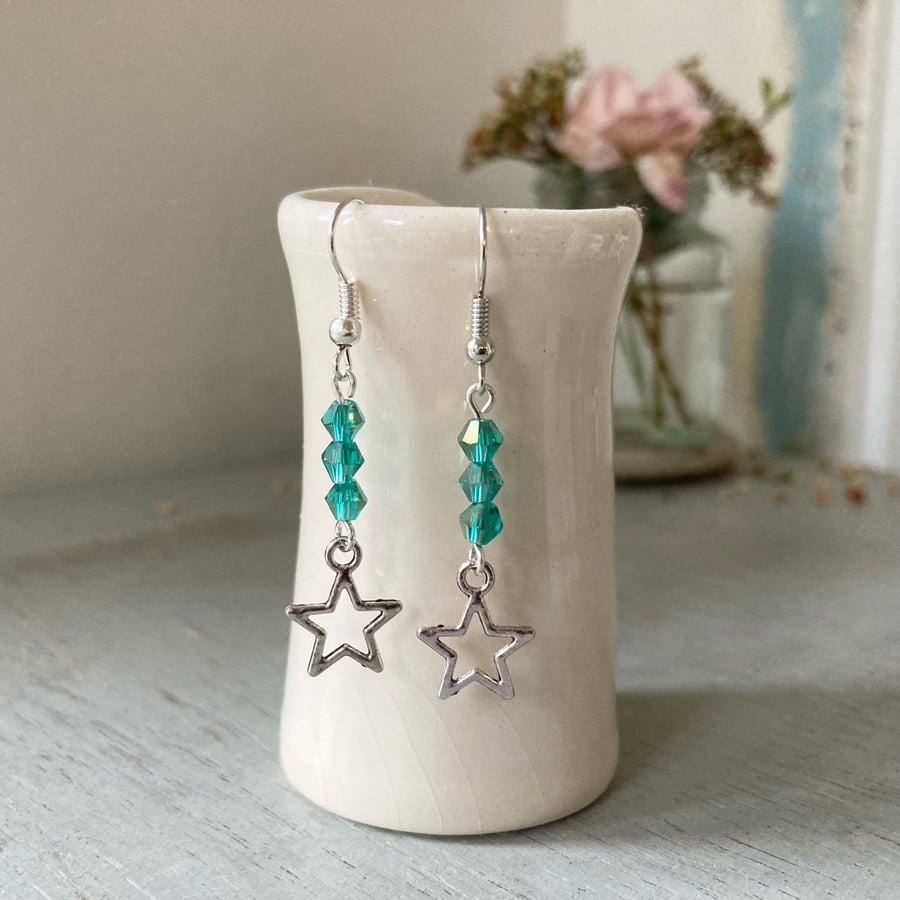 Star earrings with blue-green sparkle beads