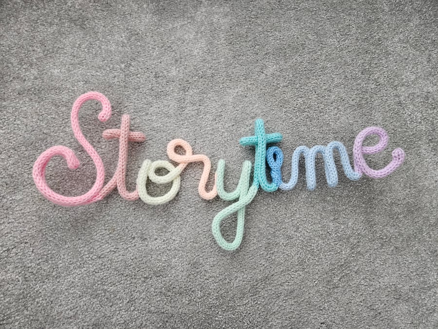 Storytime Knitted crochet wire sign Pastel
