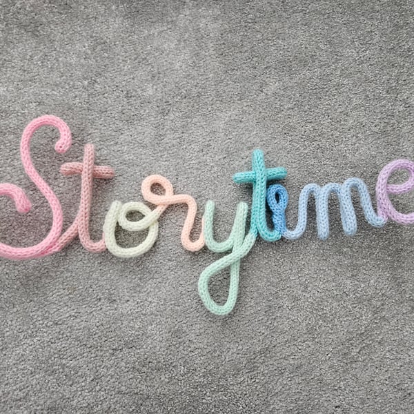 Storytime Knitted crochet wire sign Pastel
