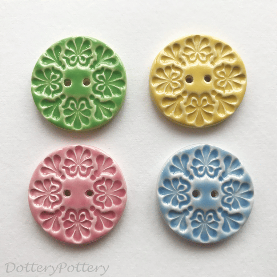 Set of four ceramic handmade buttons