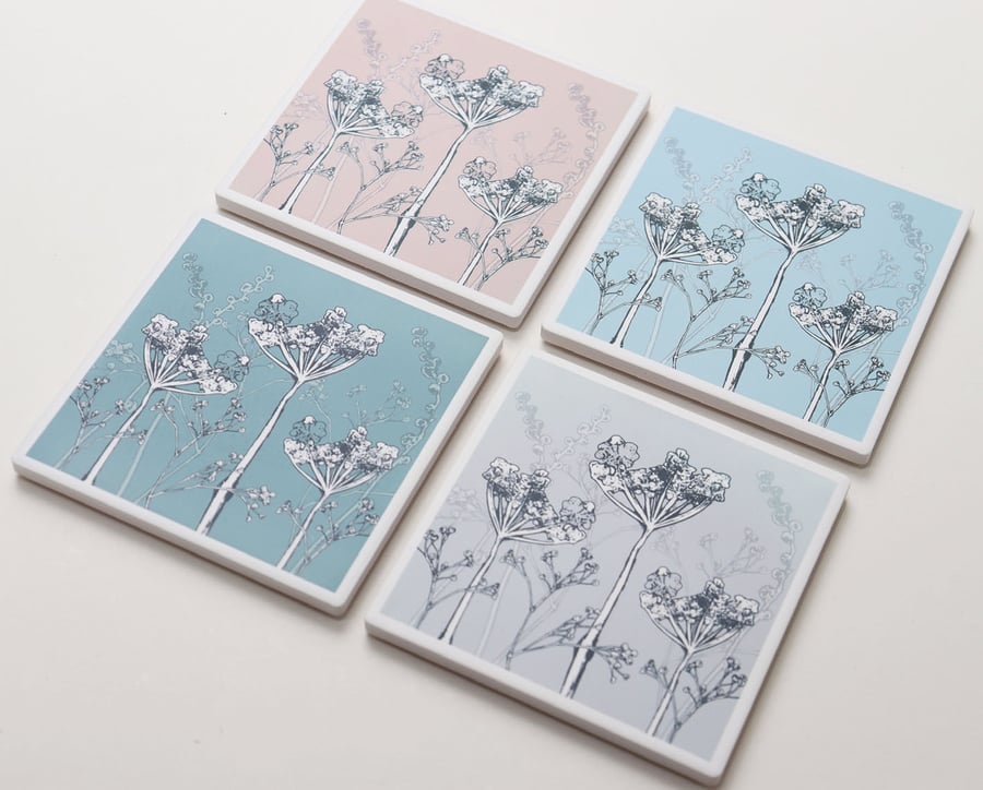 Set of four seed head design pastel coloured ceramic sandstone coasters