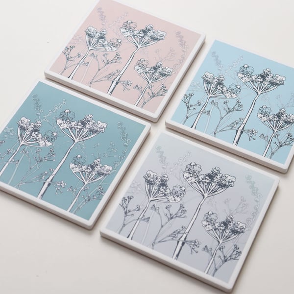 Set of four seed head design pastel coloured ceramic sandstone coasters