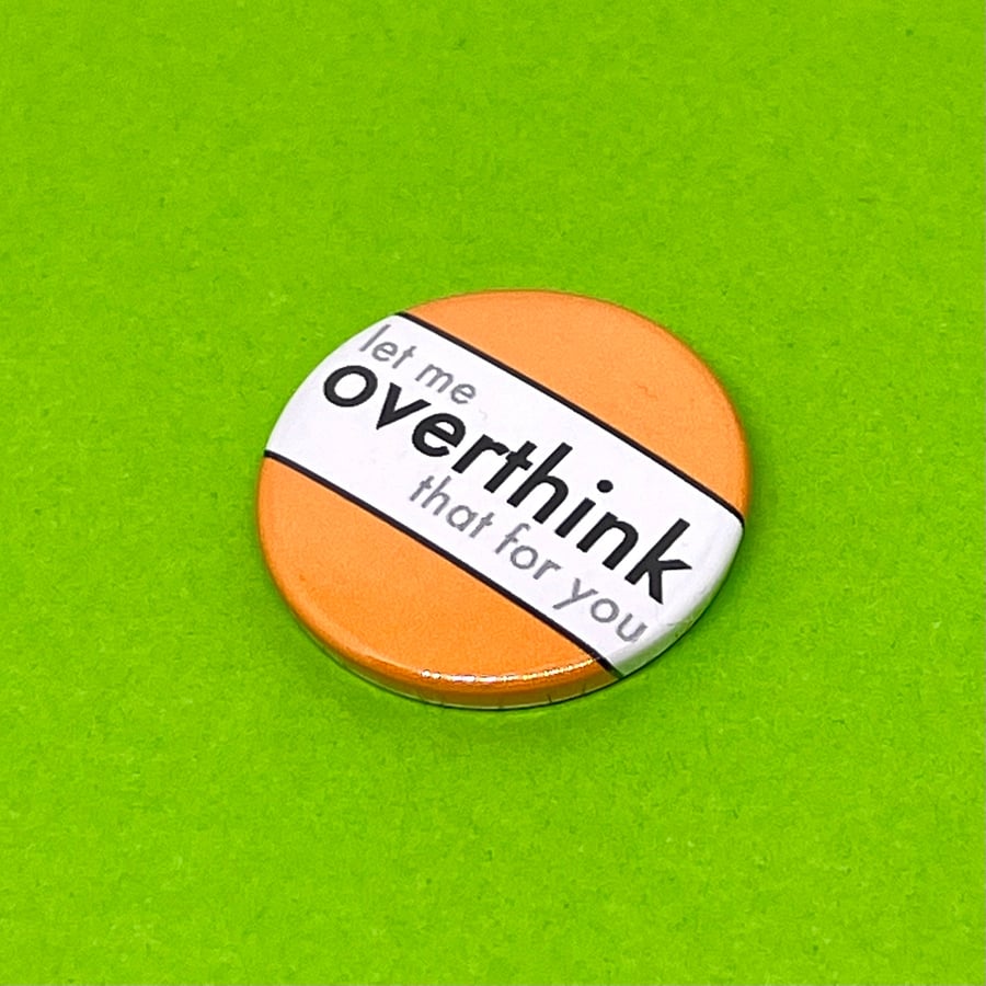 Let me overthink that for you. Badge, pocket pebble, magnet or keyring.