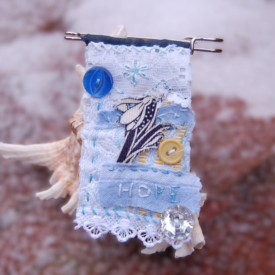 Upcycled Snowdrop Textile art hand stitched charm brooch.  Kilt pin.