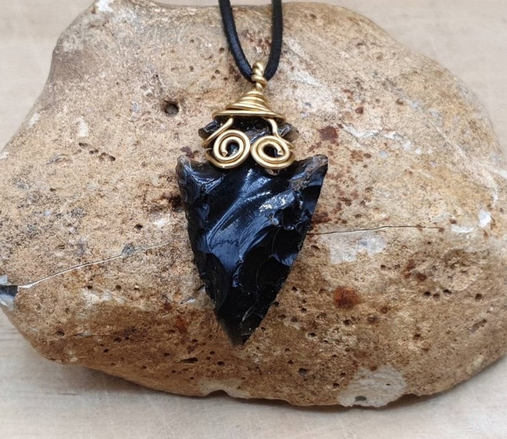 Obsidian arrowhead cheap necklace meaning