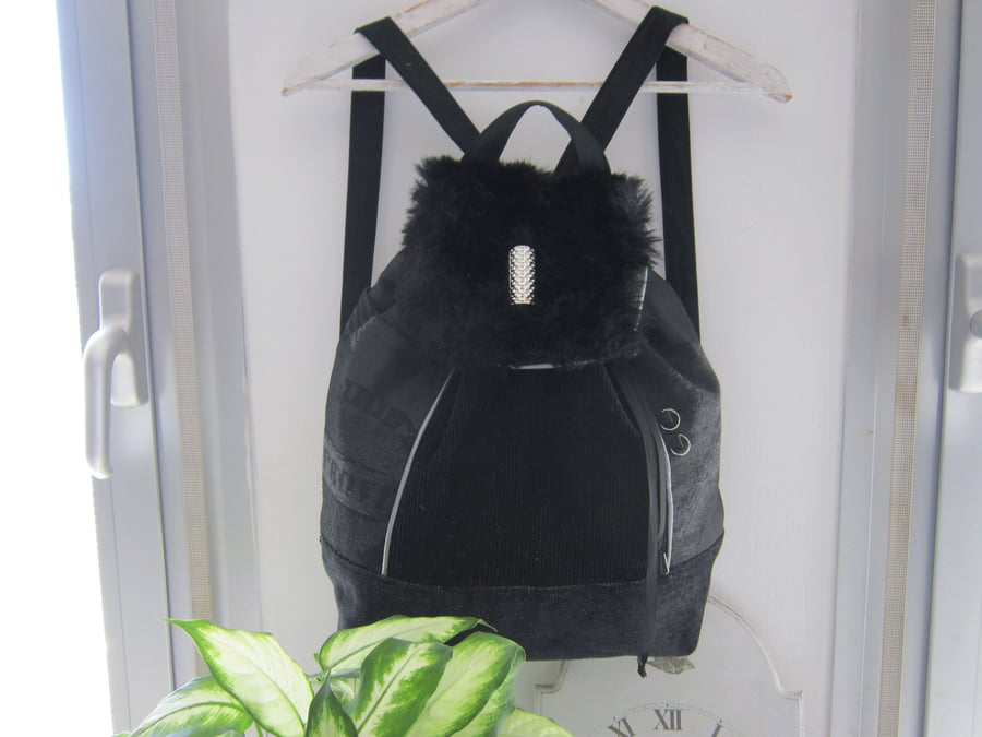 Backpack rucksack with concealed zipped pocket