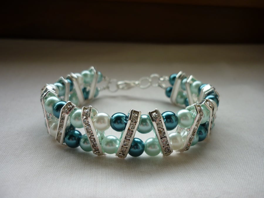 TEAL, AQUA, WHITE AND SILVER RHINESTONE BAR BRACELET.  866