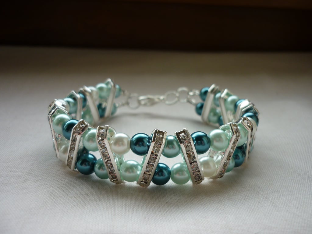 TEAL, AQUA, WHITE AND SILVER RHINESTONE BAR BRACELET.  866
