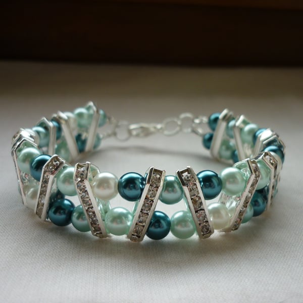 TEAL, AQUA, WHITE AND SILVER RHINESTONE BAR BRACELET.  866